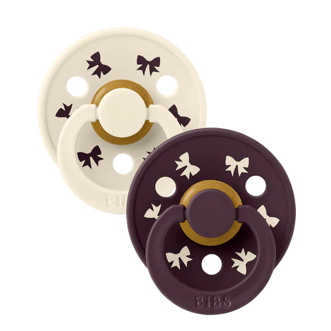 Colour Round Pacifier 2pk.- Holiday Bow Ivory/Plum