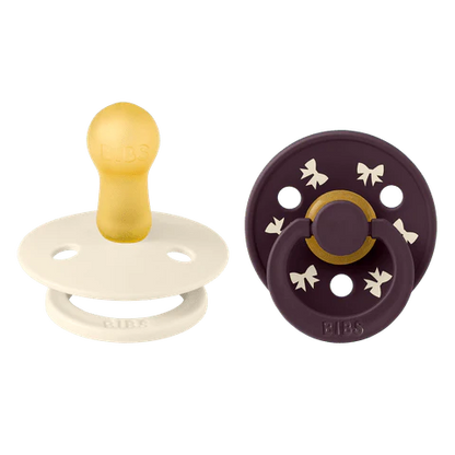 Colour Round Pacifier 2pk.- Holiday Bow Ivory/Plum